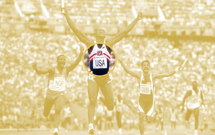 Olympic runner celebrating victory, with only the team jersey colored in.